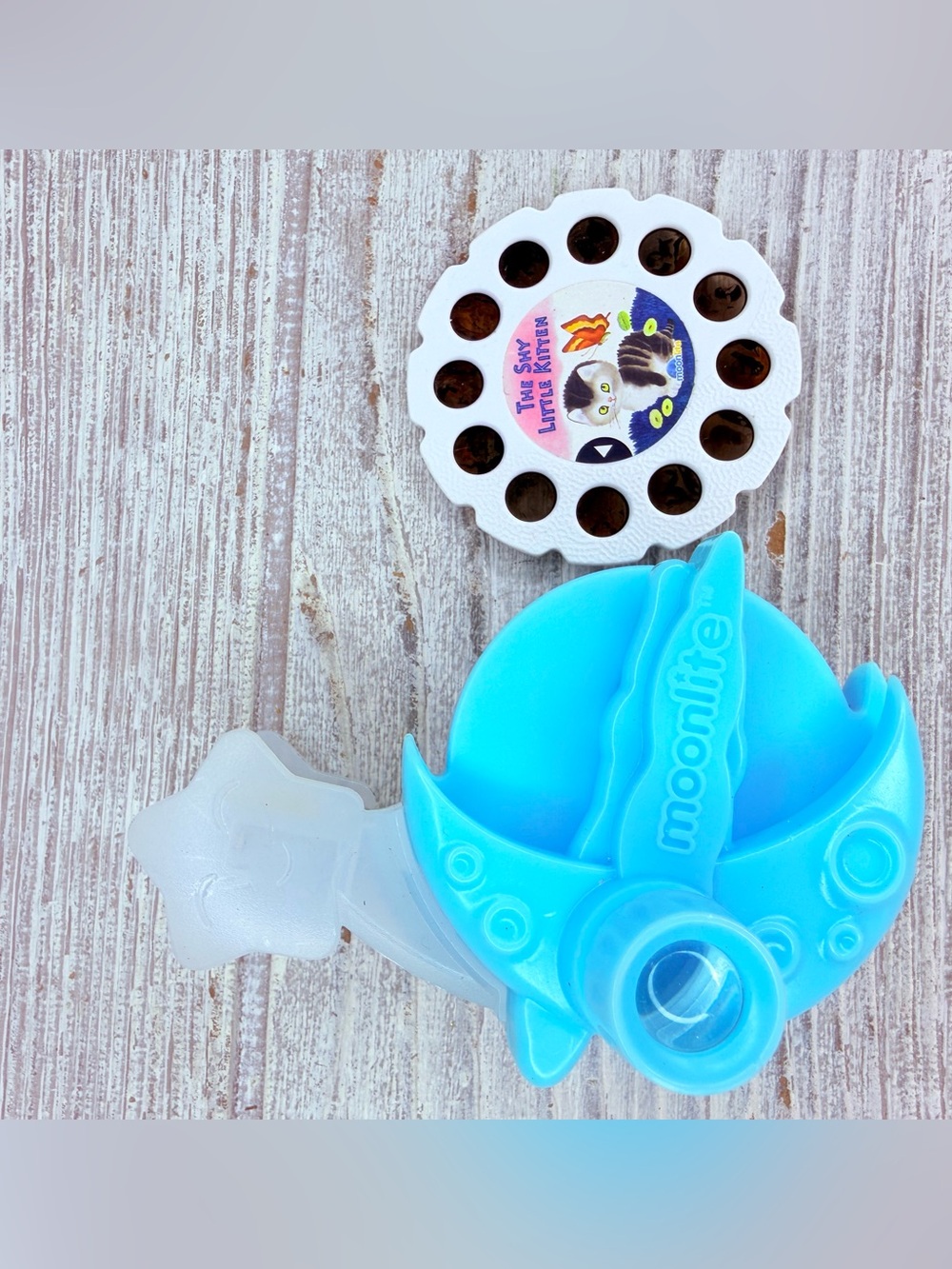 Moonlite projector for phones with one reel the shy little kitten book reel toy